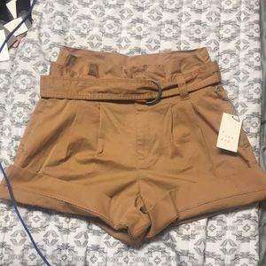 8 stretch khaki belted shorts